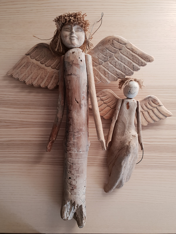 Wooden bali angels craftsmen handmade organic christmas sally bourne interiors london